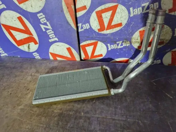 Радиатор печки Cadillac CTS 