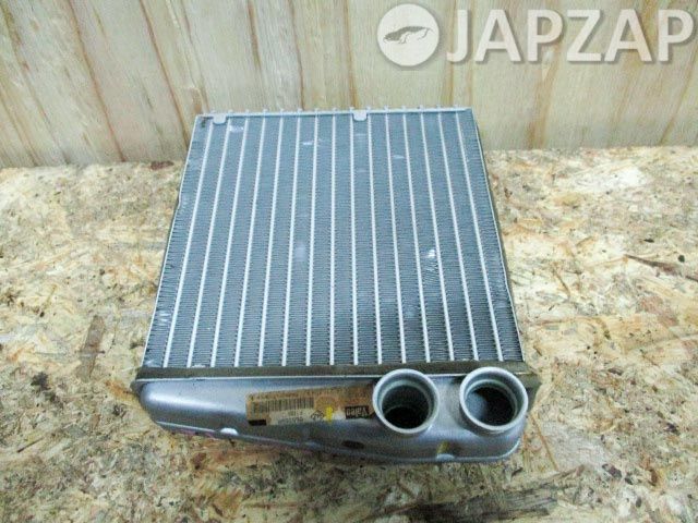 Радиатор печки для Nissan March K12        